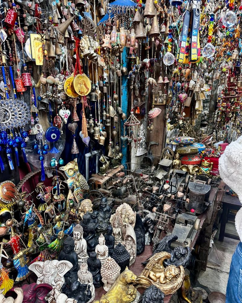 Shop packed with Buddha statues, evil eyes, and decorative items