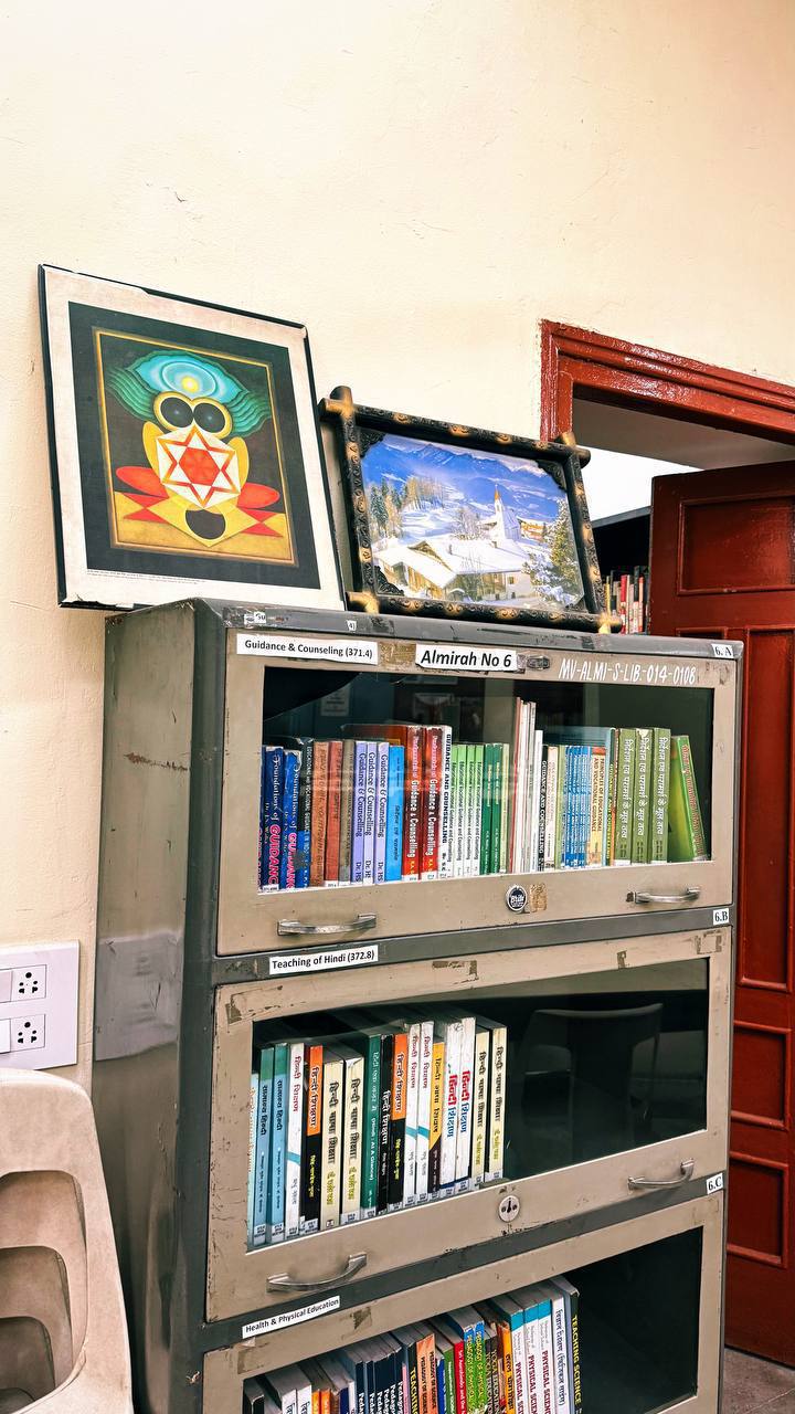 Library section with yantra artwork
