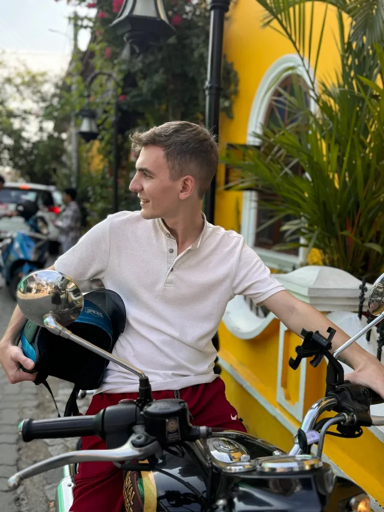 Alex on a scooter in Fort Kochi