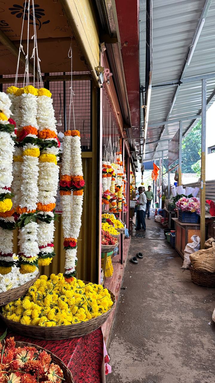 Flower garlands and marigolds at temple market